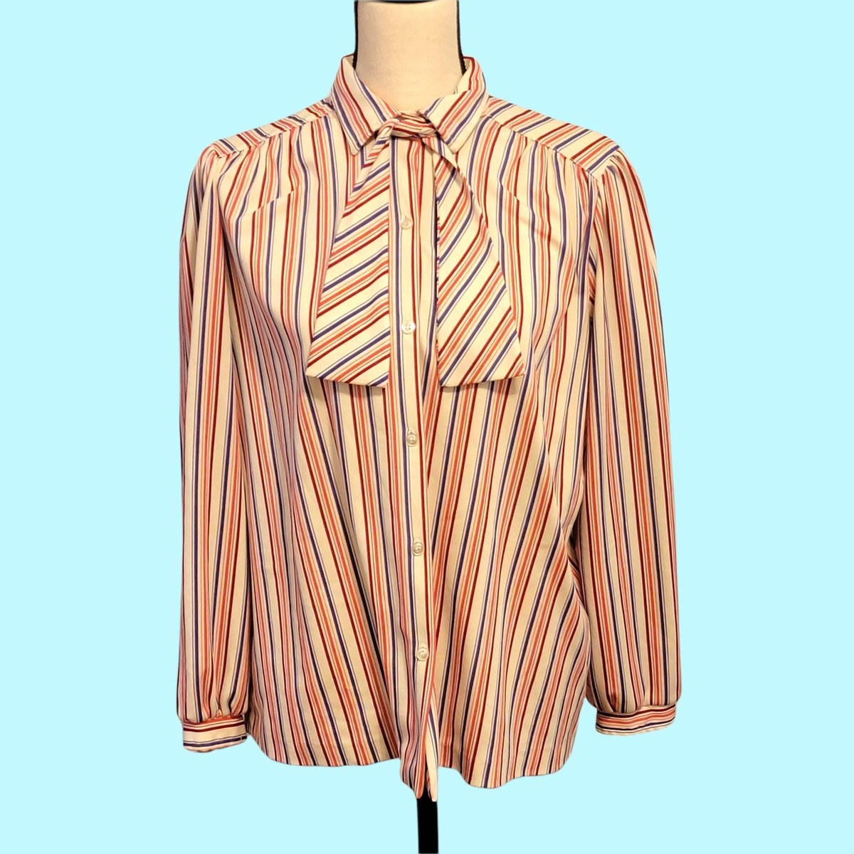 LoveAndDust's tweet photo. New to Love and Dust! 1970s Striped Pussy-Bow Blouse- The Fire Islander Woman. #1970sfashion #vintageworkwear #multicolorstripes #plussizevintage #preppy https://t.co/4UQ2Tar8c9