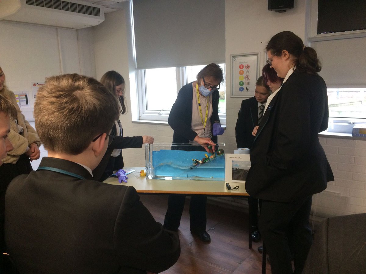 Students with Lancaster University using  their own Lego designs to see how coastal floods affect building 😊