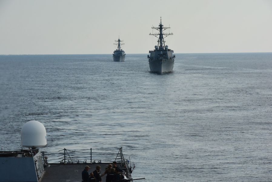 US2ndFleet's tweet photo. Sailors aboard the guided-missile destroyers USS Bainbridge (DDG-96), USS Jason Dunham (DDG-109), and USS Gonzalez (DDG-66) participate in underway, navigation evolutions as they prepare to deploy with the USS Harry S. Truman Carrier Strike Group. #HSTCSG #USNavy #FleetReadiness https://t.co/4Na7kv1nPS