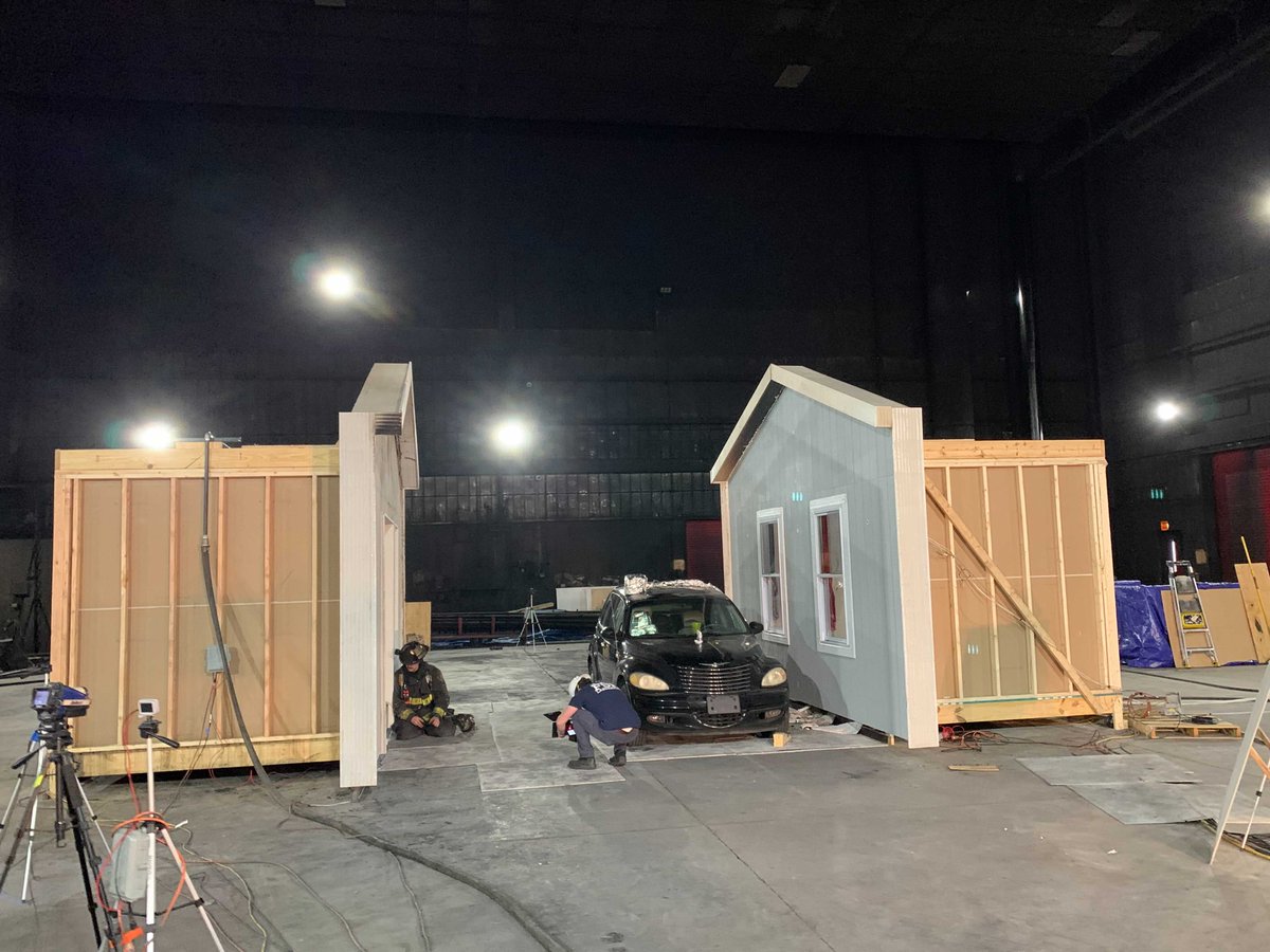FSRI_org's tweet photo. Today, FSRI is examining the effect of ladder fuels on building to building flame spread as part of the "Heat Transfer from Structure Fires" project. This test utilized a car to represent a common fuel that would be in a residential neighborhood. https://t.co/zROzZge4dT #WUI https://t.co/xAuws1bSPs