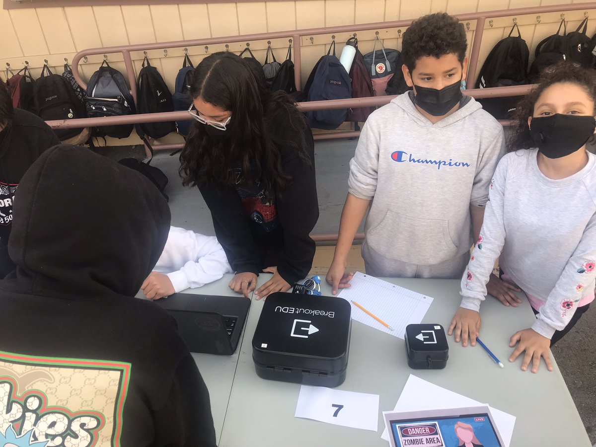 DrPhilipSwartz's tweet photo. The Zombie Apocalypse here!!! And 7th grade has to solve the Breakout EDU boxes to prevent it. The communication, collaboration, problem-solving and excitement is amazing. Good job to this amazing team!! #omsd #STEM #STEAM #vineyardstem #breakoutedu #middleschoolgoals #teamwork https://t.co/tMQfC7Oskj