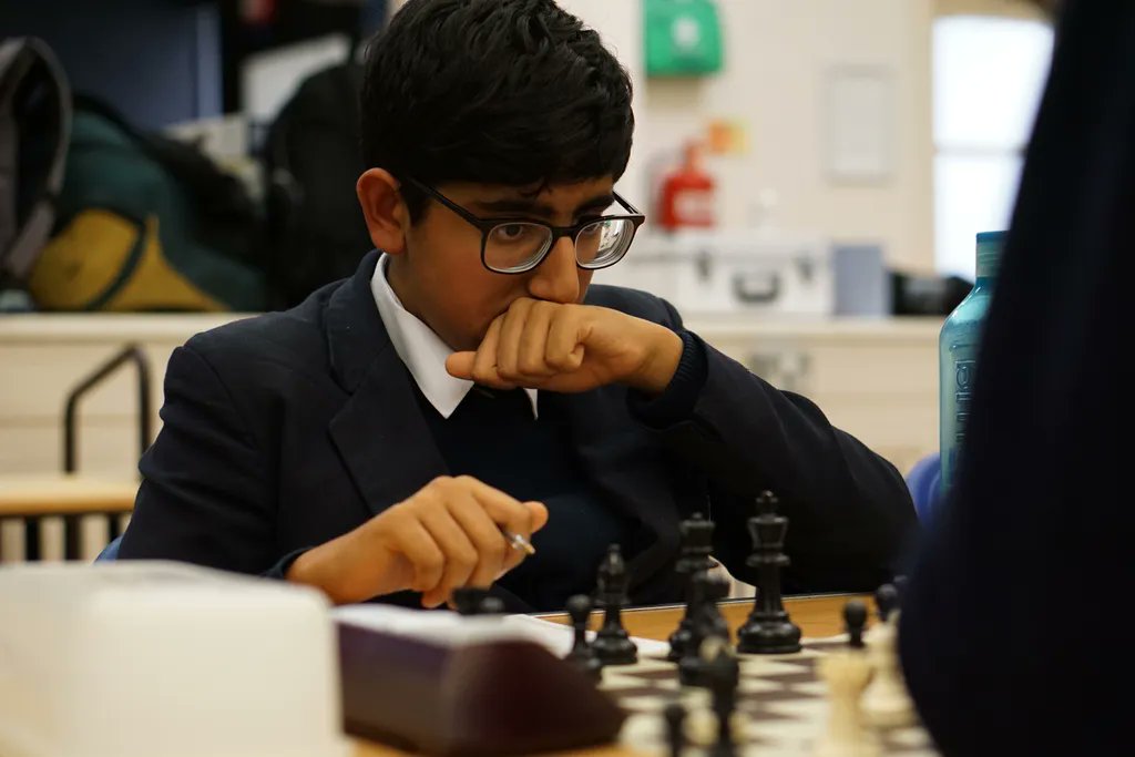 RGSGuildford's tweet photo. #RGSChess Intense focus &amp; concentration from our talented young chess players as they pit their wits against @GuildfordCounty in the @ecfchess National Schools Qualifying Round. https://t.co/zxeNvpxF4H