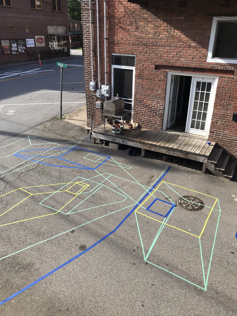 MarthaLSkinner's tweet photo. Setting up for today’s drawing! At 12 to get ahead of the ☔️ Yes! We have until 2 with clear skies + then the glow of wet asphalt will varnish our work/our play in collaboration with the sky + each other.
Old Marshall Jail NC
Photo of #alLineWay 2020 from #AsphaltDrawingSeries https://t.co/8dQfRhD6og