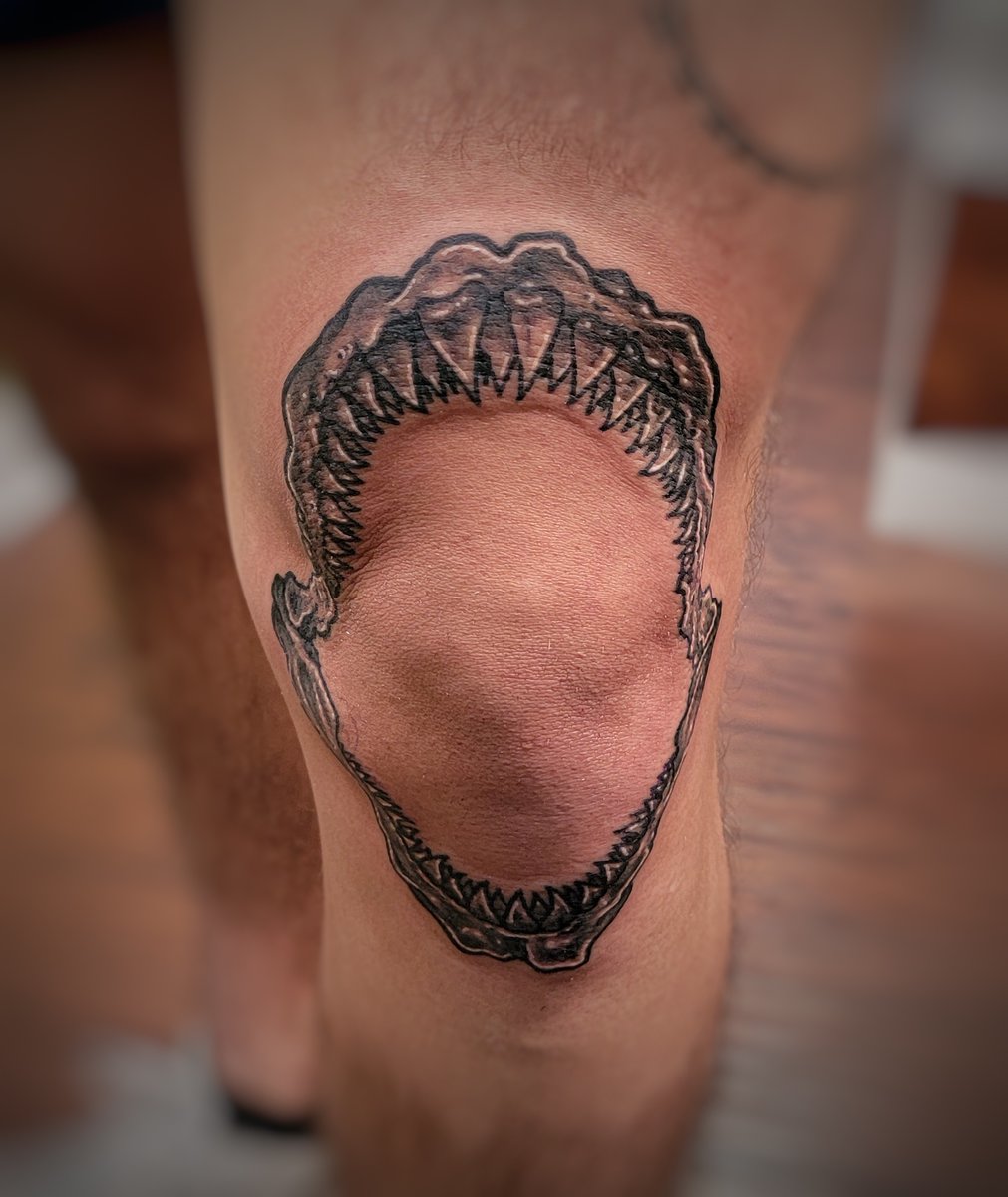 Shark Jaw Tattoo Around Knee - Bold & Raw