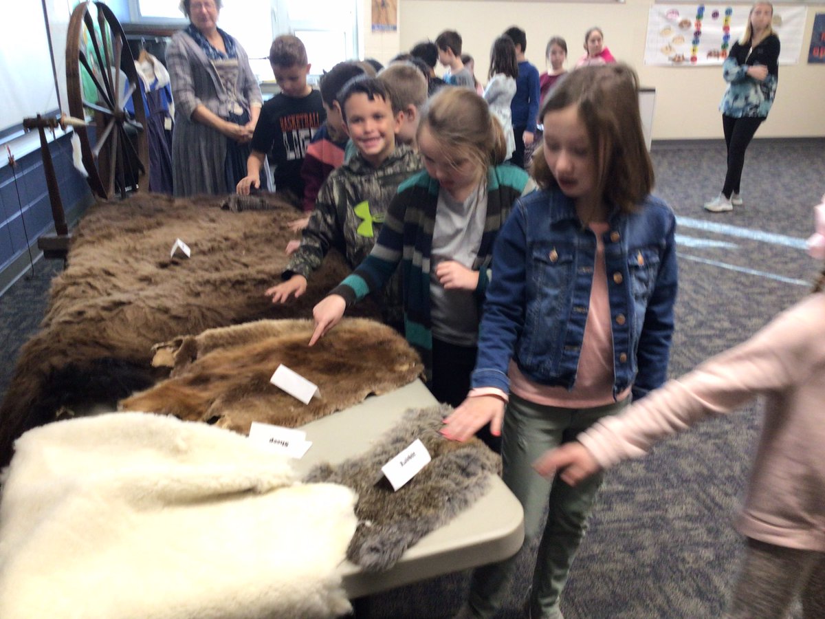 2ndwithMrsZ's tweet photo. Today we got to learn and experience the daily life from the Revolutionary War and the War of 1812 time period.  Thank you Mr. and Mrs. Hainlen for letting us see and hear all you know!  #2ndgraderocks https://t.co/fTgHG1uvD9
