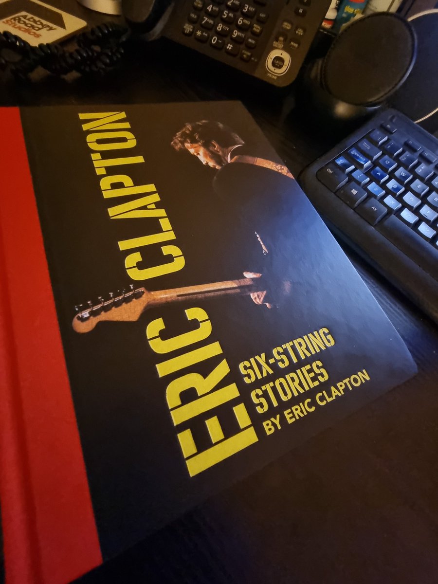 Quizbritain's tweet photo. Reviewing my latest read. For all @EricClapton fans this must have detailed book by @genesiseditions focuses on his cherished guitars. Why wait until Christmas? #sixstringstories #EricClapton https://t.co/hE1nwkkB2e