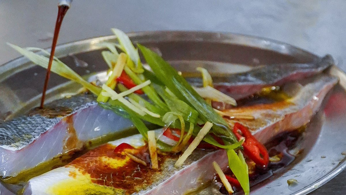 Preparing our infamous steamed seabass with soy, chilli, ginger &amp; spring onions.

One of our favourite dishes