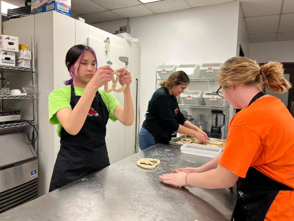 NorthDakotaCTE's tweet photo. Lake Area CTC Culinary Arts students were so excited after their 1st attempt at a “mall style” pretzel in lab that they convinced their FCCLA adviser to hold a fundraiser for #NDFCCLA. Over 400 pretzels sold and the chapter will be donating the $1,000+ profits to charity!
#ND_CTE https://t.co/u83HH0yiqt
