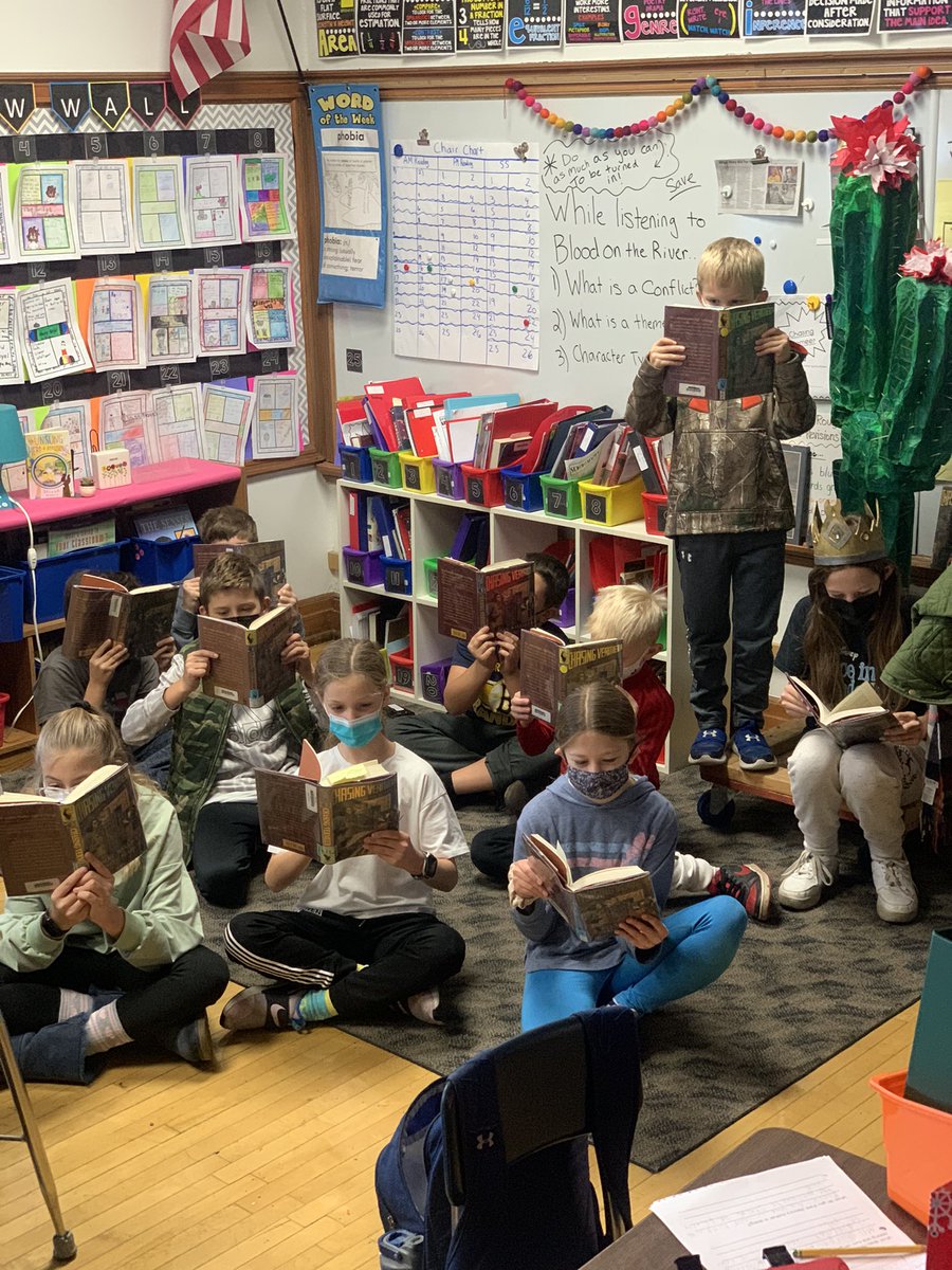 MrsRevak's tweet photo. Thankful for our class novel for bringing us together. Finishing #chasingvermeer before Thanksgiving Break. Spotted: a student’s Ecosystem cactus project, and a photo-bomber. https://t.co/AEVUw4eZ5s