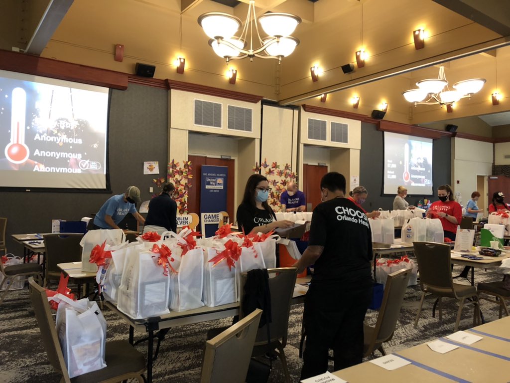 hfuw's tweet photo. Day 4! Our friends at @orlandohealth are busy packing Thanksgiving meal kits at Thanksgiving Project! Thank you for volunteering with us today and for supporting your community this season. #LiveUnited #ThanksgivingProject https://t.co/LXAdo1igKK