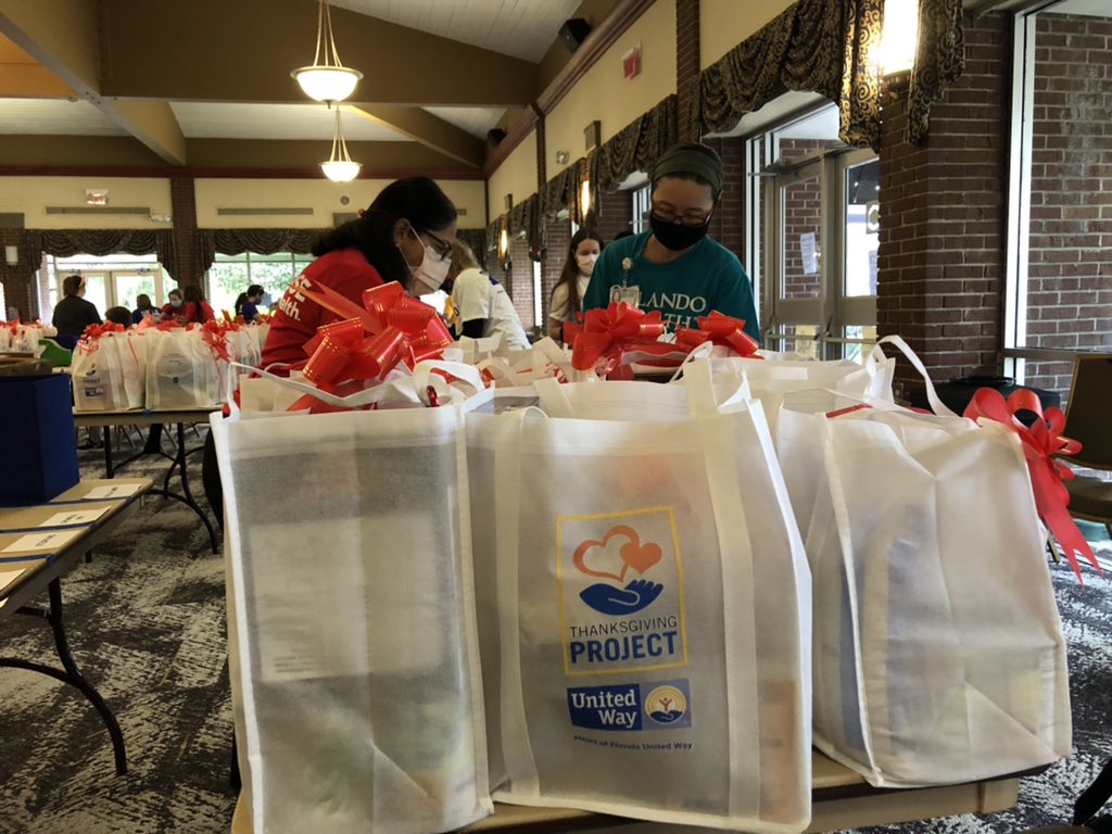 hfuw's tweet photo. Day 4! Our friends at @orlandohealth are busy packing Thanksgiving meal kits at Thanksgiving Project! Thank you for volunteering with us today and for supporting your community this season. #LiveUnited #ThanksgivingProject https://t.co/LXAdo1igKK
