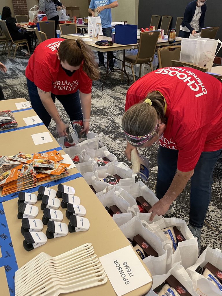 hfuw's tweet photo. Day 4! Our friends at @orlandohealth are busy packing Thanksgiving meal kits at Thanksgiving Project! Thank you for volunteering with us today and for supporting your community this season. #LiveUnited #ThanksgivingProject https://t.co/LXAdo1igKK