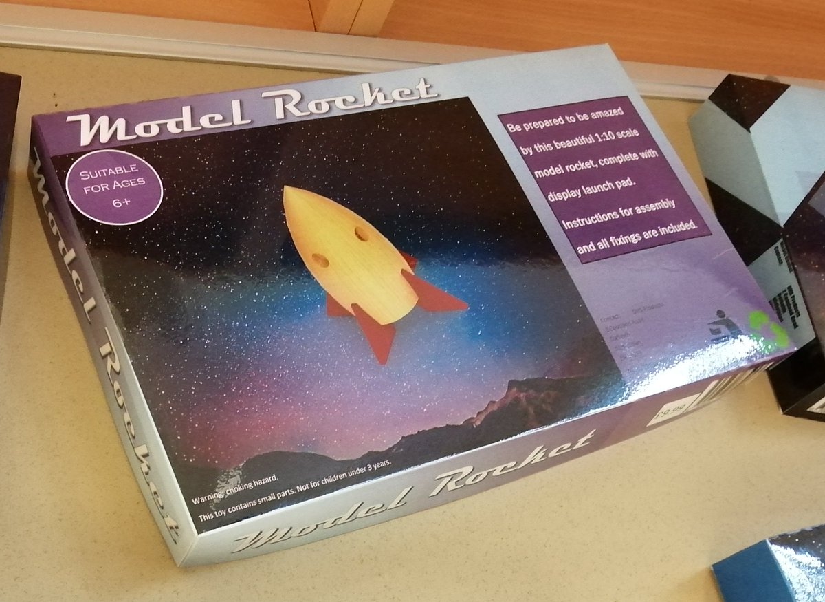 New promotional graphics display by N4/5 Graphic Communication. Packaging designs for a model rocket using a variety 3D CAD modelling and DTP skills, techniques and principles. <a href="/official_DHS/">Dalkeith High School</a>