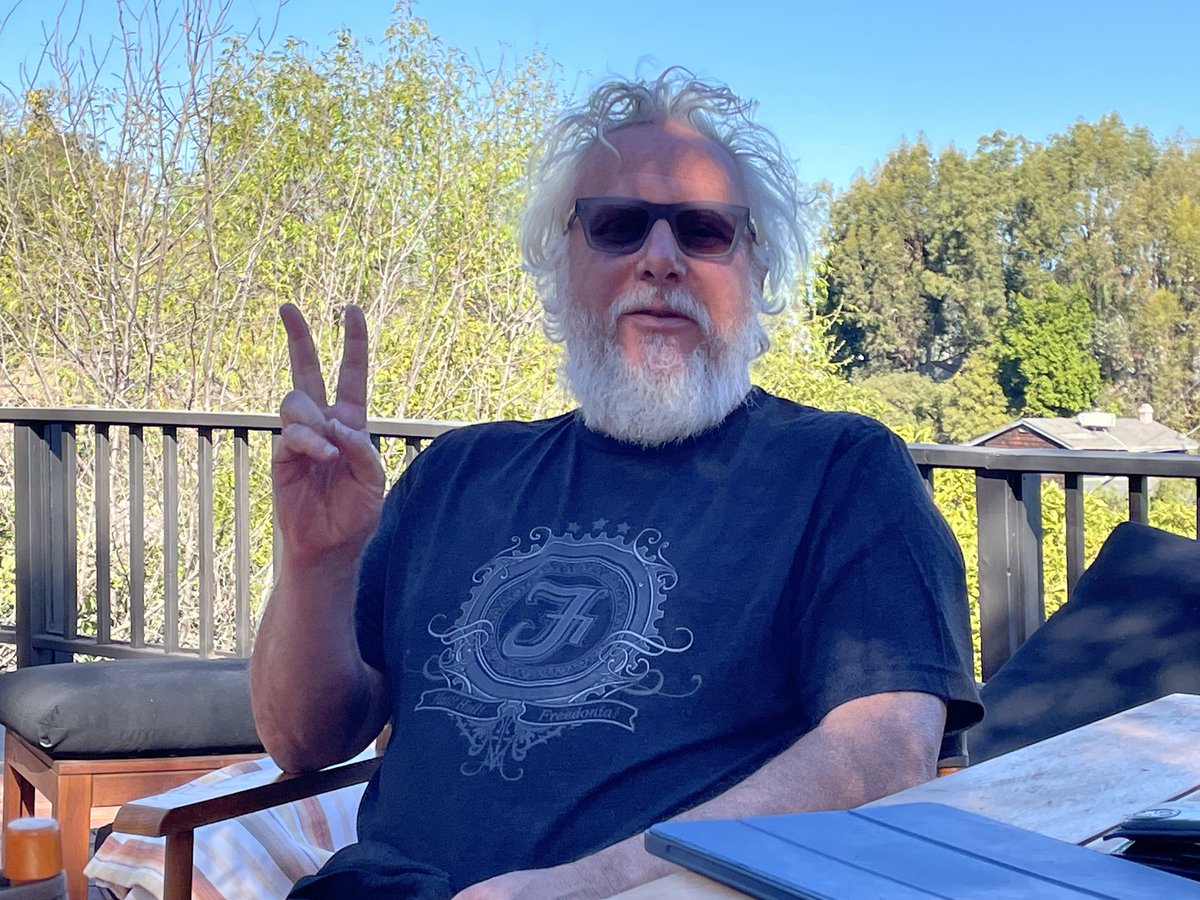Karaszewski's tweet image. You all thought my crazy hair was just a Covid beard but it was actually a writing/researching the Grateful Dead movie beard! A total dream come true project for us to collaborate with Scorsese (!!!) and Jonah to celebrate this incredible story of the band’s long strange trip.