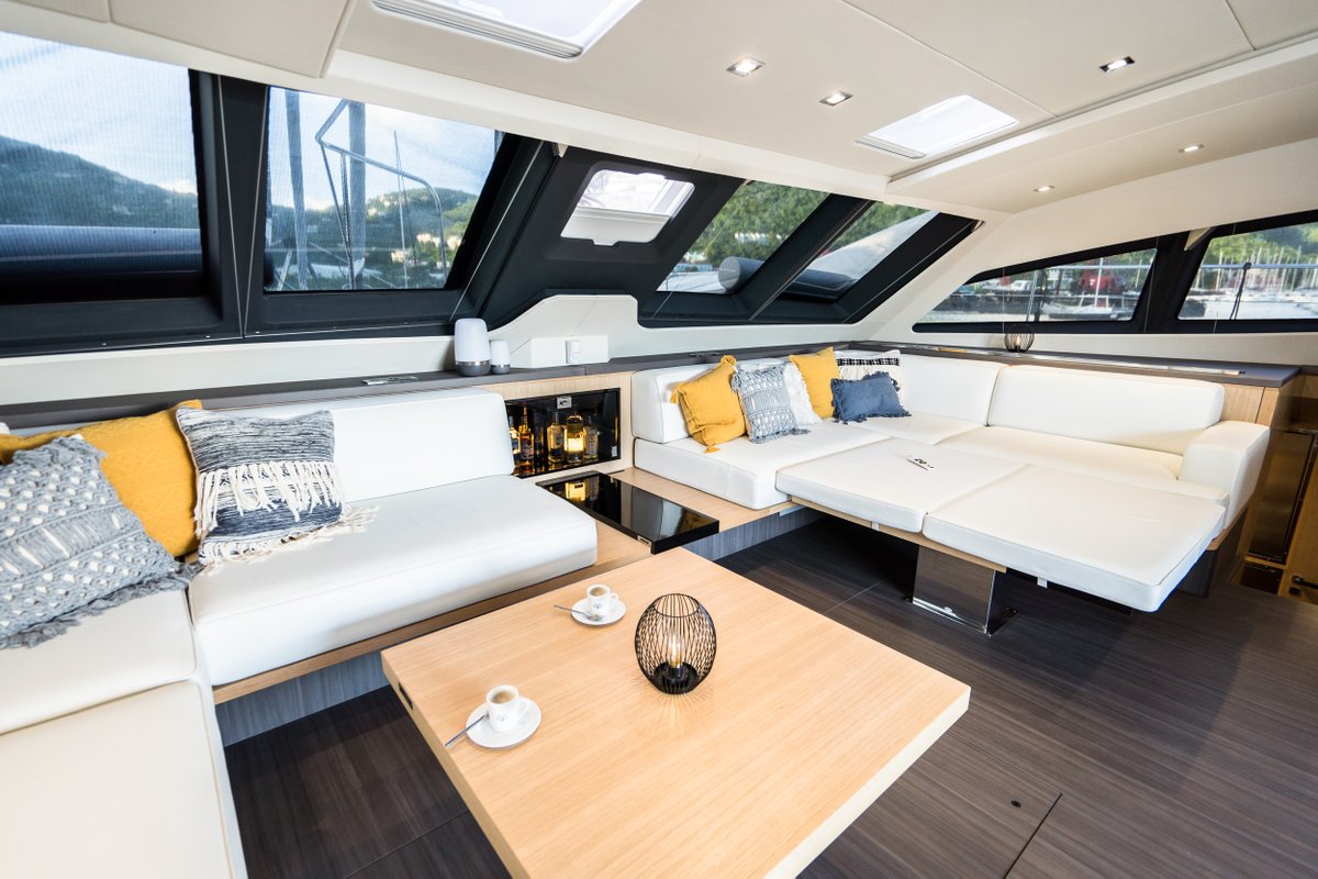 PrivilegeCatsUS's tweet photo. The adjustable layout on the newest Privilège Series 640 reflects the individual nature of the yacht owner. Here is just one examples of the versatile convertible layout aboard Segundo Viento - casual lounging #privilegecatamarans #luxurycharter #sailing https://t.co/zXoAIEGyAj