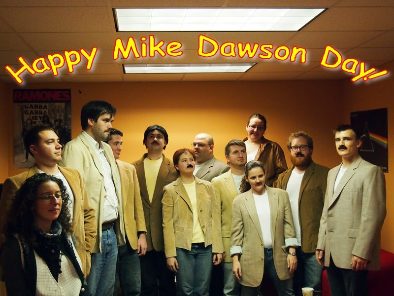 MarkBrezinski's tweet photo. Today is the 10 year anniversary of Mike Dawson Day! 🥳 I'm celebrating in the traditional way, by donning my finest tan blazer and worst fake mustache and solving some puzzles in an officially-licensed Giger hellscape. https://t.co/UJtfLsF74v