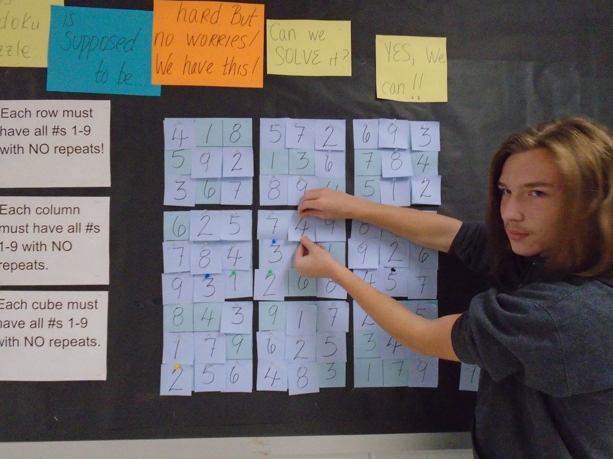 WHSLibrary6's tweet photo. Freshman Gavin L. puts the last piece of the HIGH DIFFICULTY sudoku puzzle on the board.  Our Warriors solved it in less than a school day.  #whs #WHSLibrary #library #GreatDayToBeAWarrior https://t.co/jRGlyd3Cgx