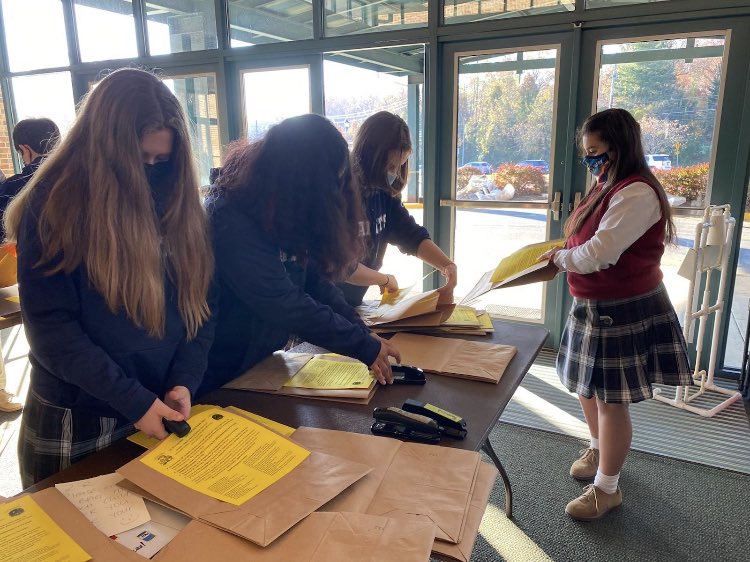 StEsRockville's tweet photo. Thank you to all of the 7th grade students for assembling Greg Gannon Food Drive bags today! 

Today, one bag will go home with each St. E’s student. Bags can be returned on December 2nd &amp; 3rd at dismissal. Our goal is to completely fill at least one truck.
#ggcfd 
#stesstrong https://t.co/0i1xmypE8J