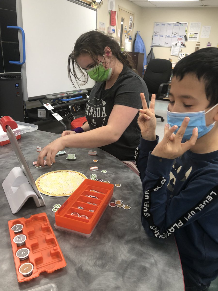NobleQEPS's tweet photo. Who wants a slice of pizza? Using Osmo  Pizza Co. to practice taking orders and making change. Thank you GECDSB Spec. Ed. for the robotics lending library! #GECDSBGAINS @MikeWil03652704 @Newtonjn13 @MDBennieBulldog https://t.co/lv9P14E2vs