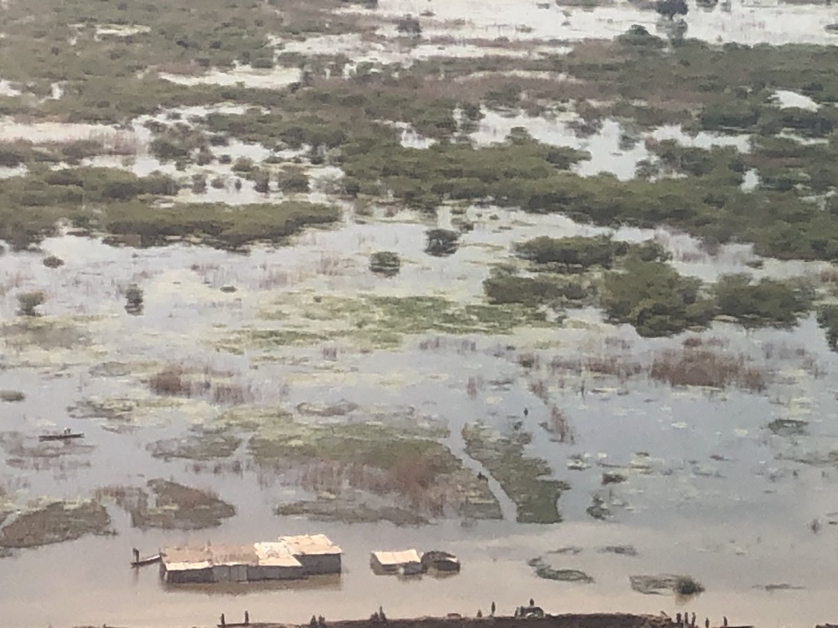 mkampjensen's tweet photo. The area around Bentiu #SouthSudan has flooding as far as the eye can reach. The @UN has helped build levees that keep water from reaching thousands of mostly women &amp; children. @Unicef &amp; partners are proving life-saving assistance w/ thanks to donors. But much more is needed. https://t.co/tV0pARBE95