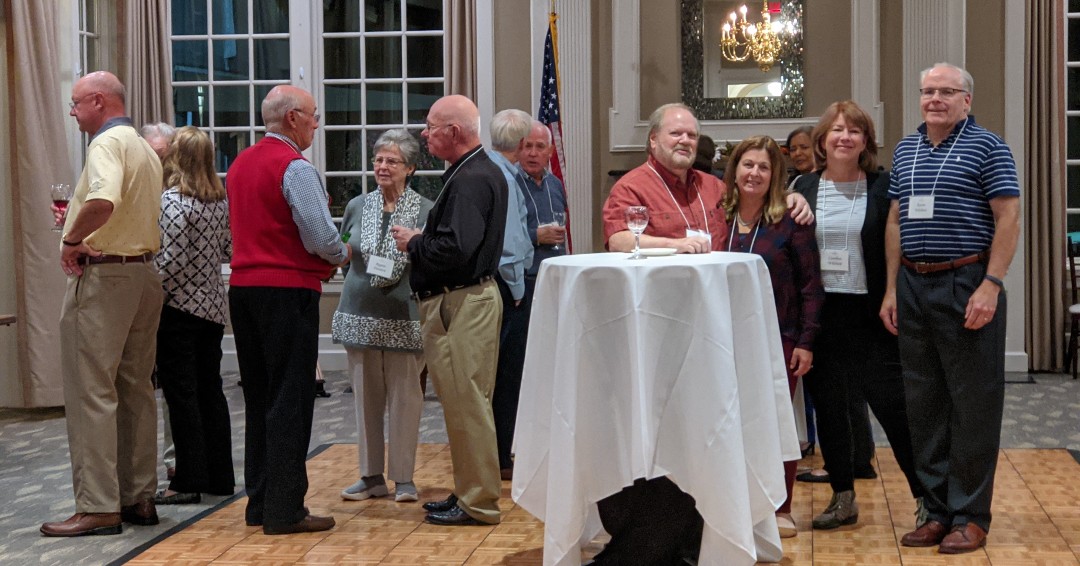 Such a beautiful night with 70 degrees, bar on the patio, lovely harpist, and a full moon -- a perfect evening for our New Member Mixer!
