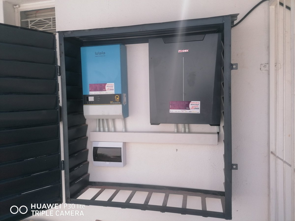 Eng_Madziva's tweet photo. Energy Update. Installation of Outside door Cabinets is growing. Check out this installation with a 6kW TBB Transformer based inverter and a wall Mountable Weco Lithium Battery all in one cabinet placed under alarm and key for security. #SolarShackInstallation https://t.co/rvIlgEnkIA
