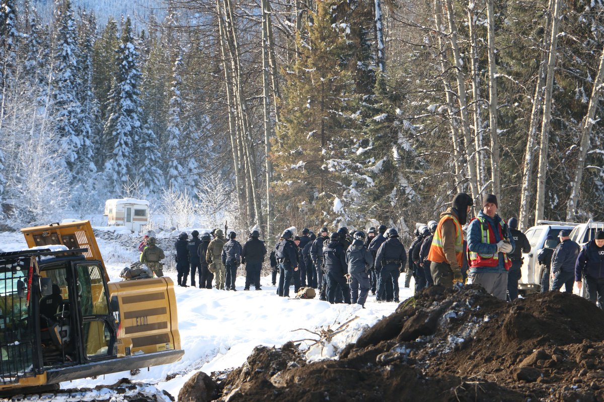 Roughly 50 RCMP officers moved into #Wetsuweten <a href="/Gidimten/">Gidimt’en Checkpoint</a> Clan territory today, arresting 15 people. One person, a journalist, was released without conditions. Story to come in <a href="/TheTyee/">The Tyee</a>. #bcpoli #cdnpoli