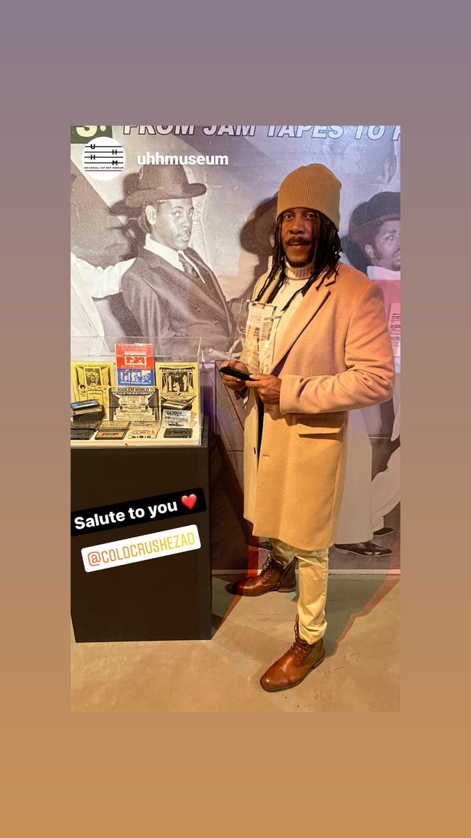 Welcome Hip Hop History Month November 2021. Easy A.D is at The Universal Hip Hop Museum in The Bronx. Easy A.D is standing next to a large photo of him self on the wall. Easy A.D was their to receive the award from the museum.
