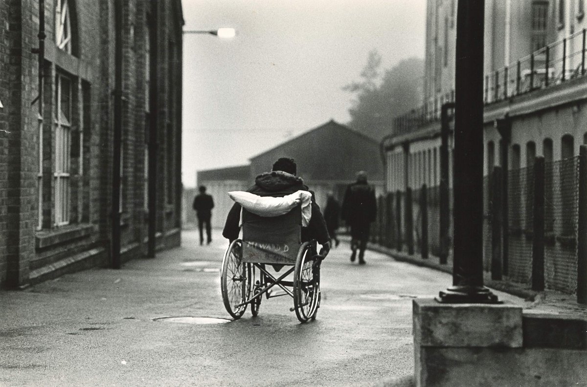 Also re-visiting <a href="/DrDavidMT/">David Turner</a>'s reflections on <a href="/RaissaPage/">Raissa Page collection</a> photograph, 'Hospital Grounds' (1981) and the history of long stay institutions, for 'Life Through a Lens' online exhibition. Text &amp; audio available here: raissapagecollection.wordpress.com/portfolio/hosp… #DisabilityHistoryMonth