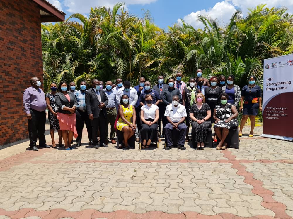 UKHSA's tweet photo. (3/3) They’ve also co-hosted a tabletop exercise in Zambia with @ZMPublicHealth to validate their All Hazards Preparedness and Response plan. This plan will help different teams to coordinate their efforts in response to public health emergencies. #IHR_Strengthening #GlobalHealth https://t.co/GS1EB7hZLS