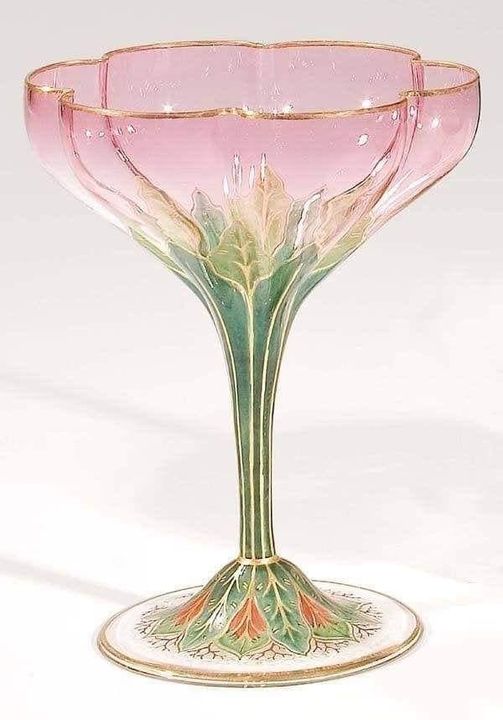 I collect vintage glasses, I love them, but I have never seen anything as lovely as this champagne glass.