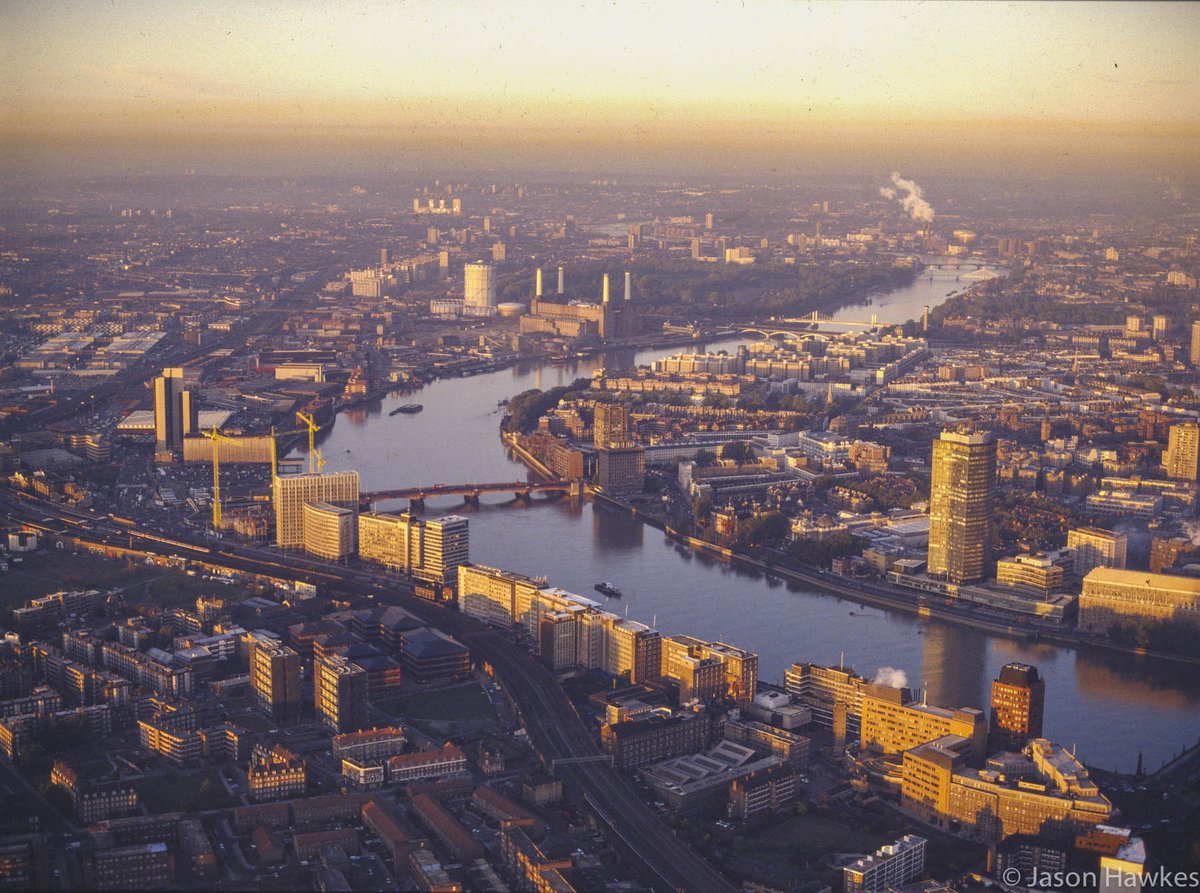 jasonhawkesphot's tweet photo. I can’t even guess when the 1st image was taken. Looking over  #AlbertEmbankment, #Pimlico, #Vauxhall, #NineElms, #Battersea, #London. #AerialViews https://t.co/gVKhpj91ck