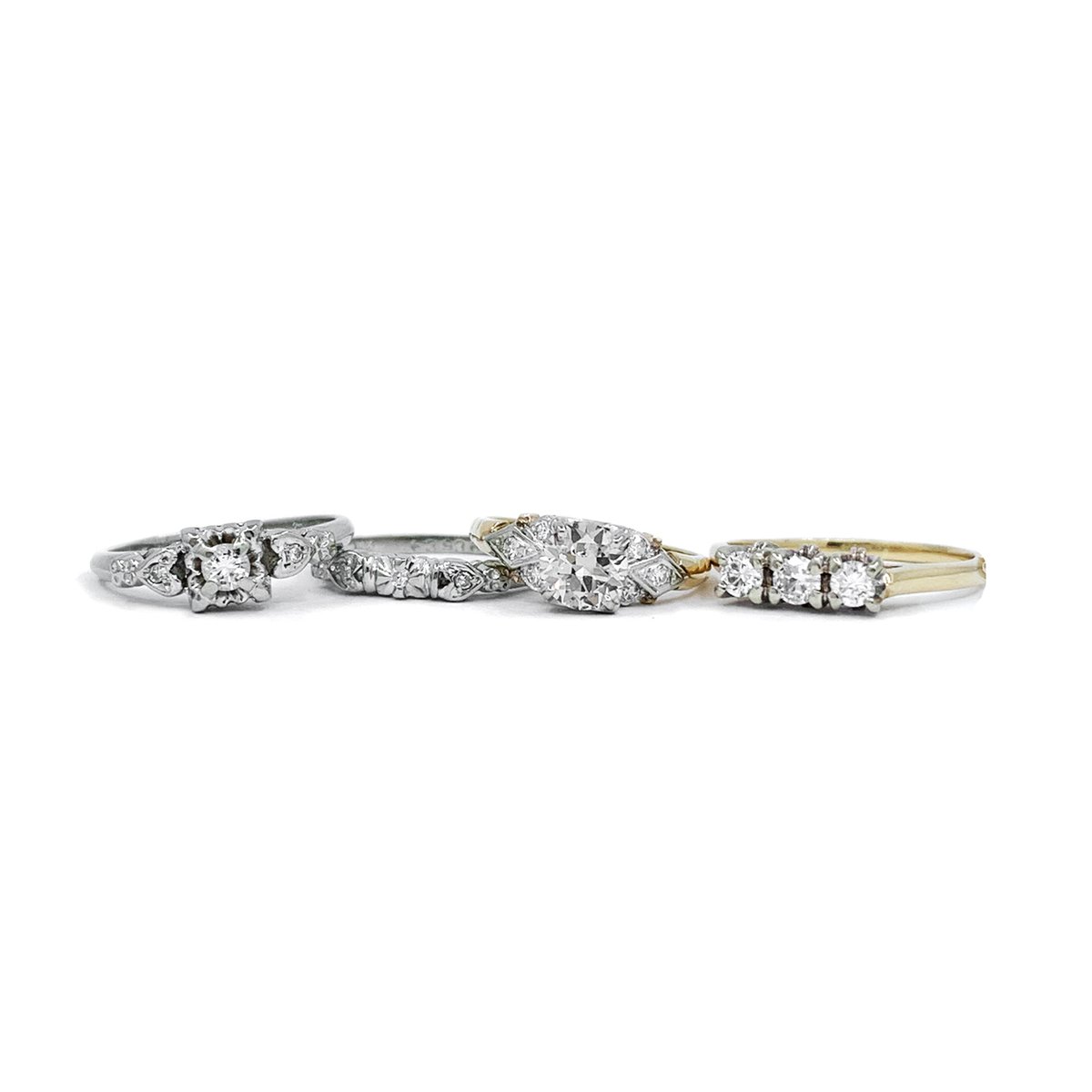 Our client came to us with the vision of repurposing the rings she had inherited from her mother and both grandmothers to create a ring that would allow them to be worn all together.  

Let us tell YOUR story.