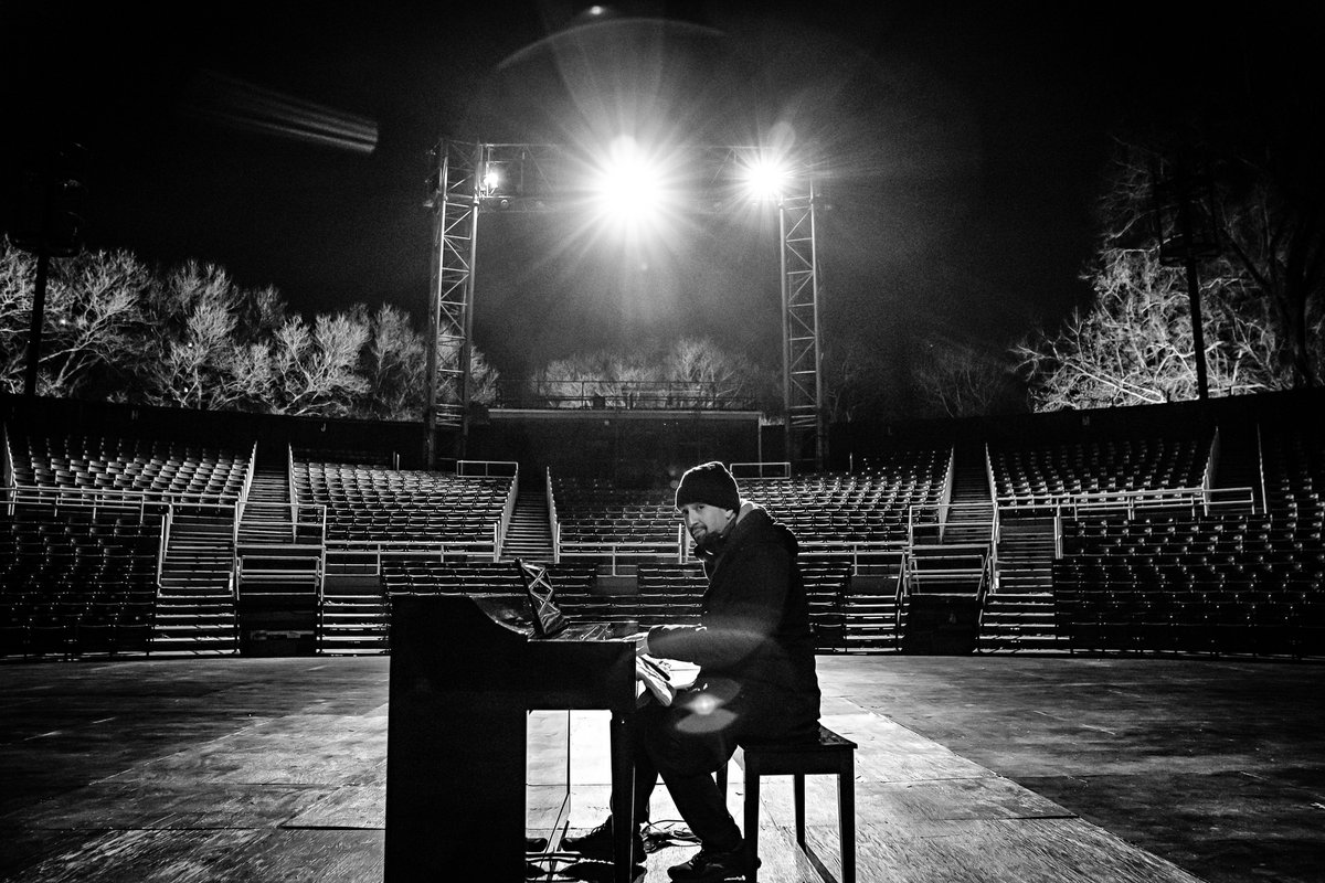 At the piano in the Delacorte, night, black and white photo