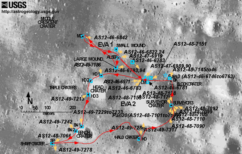 USGS Traverse Map - Gray cratered background map of the lunar surface with path of the astronaut's exploration noted as a red line with red arrows. Stations are labeled as blue squares and yellow arrows and are labeled with black labels. A larger image can be found at this link: https://astrogeology.usgs.gov/search/details?id=/Moon/Apollo/Traverse/AP12Trav.jpg