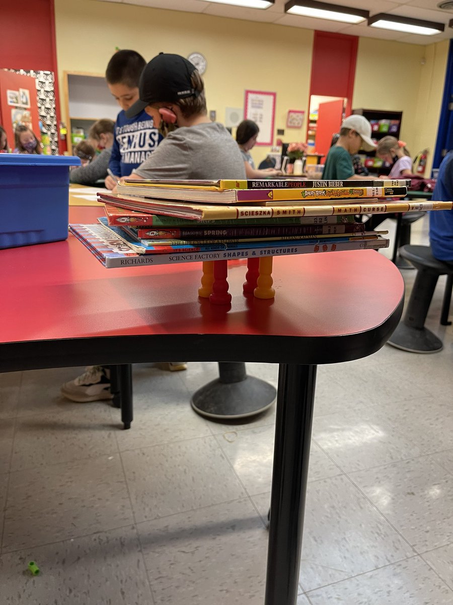mrssquires_'s tweet photo. Our first #BridgeBuildingChallenge in the LLC! Can you build a bridge that holds 30 books? We can! 👏🏼 #@Goulds_Elem #STEAM #InquiryBasedLearning https://t.co/4f0CRtgYEq