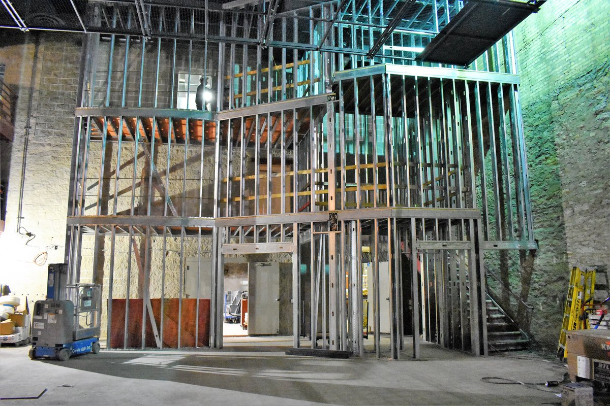 NTH_INC's tweet photo. “A peek at our LAB Theater project – crews are framing walls, installing tension wire grid, and building a new sidewalk ramp.”  @LSBlackBuilds @mnopera @shelterdesigns @schulershook https://t.co/zkwMz17JmC