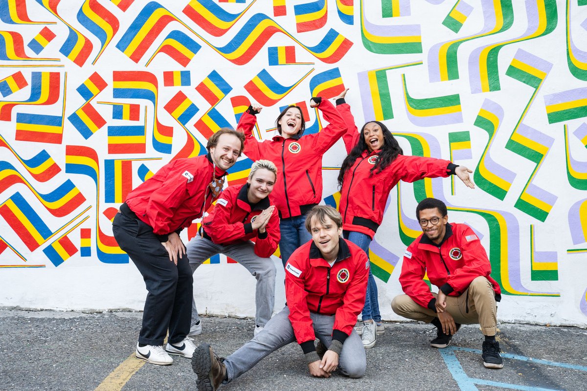 CityYearPhilly's tweet photo. Our @AmeriCorps members are jumping for joy because they're finally #RedJacketReady! After a long wait due to global shipping delays, our Corps members were thrilled to receive their full uniforms at the beginning of the month. Check out some of their silliest group poses! https://t.co/76668uaCPz