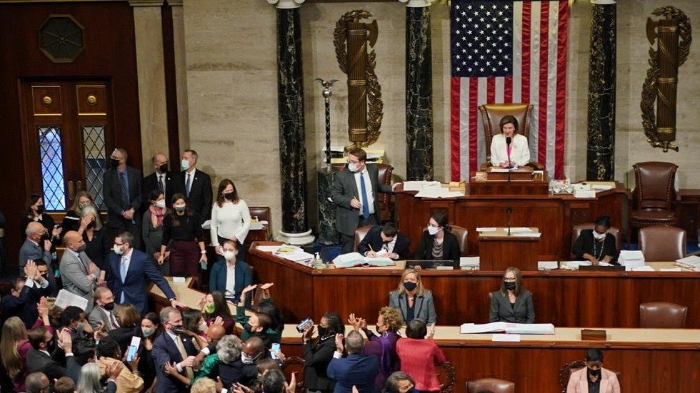 thehill's tweet photo. House Democrats pass their mammoth social spending and climate plan in a 220-213 vote https://t.co/2MyB9ul7g0 https://t.co/N8aR7uhAUC