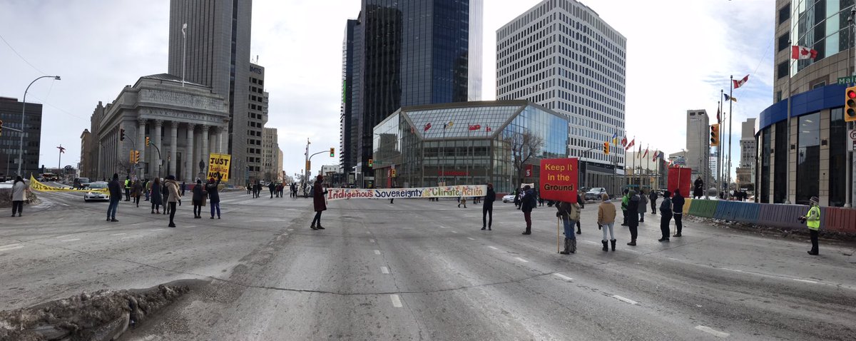 Another action shutting it down at Portage & Main in #Winnipeg. We won’t stop until #RCMPofftheYintah in solidarity @Gidimten all across so called Canada #AllOutForWedzinKwa #ShutDownCanada 🔥
