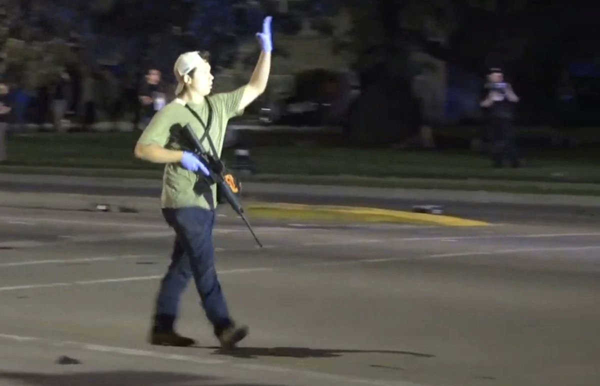 IAmTehran's tweet photo. CHARGE:  POSSESSION OF A DANGEROUS WEAPON BY A PERSON UNDER 18.

Here is a picture of #KyleRittenhouse possessing a "Dangerous Weapon" at age 17 - which he crossed state lines to do.

VERDICT:  NOT GUILTY.

Please explain HOW TF this is even possible?!
#KyleRittenhouseverdict https://t.co/4ku7C7iDmL