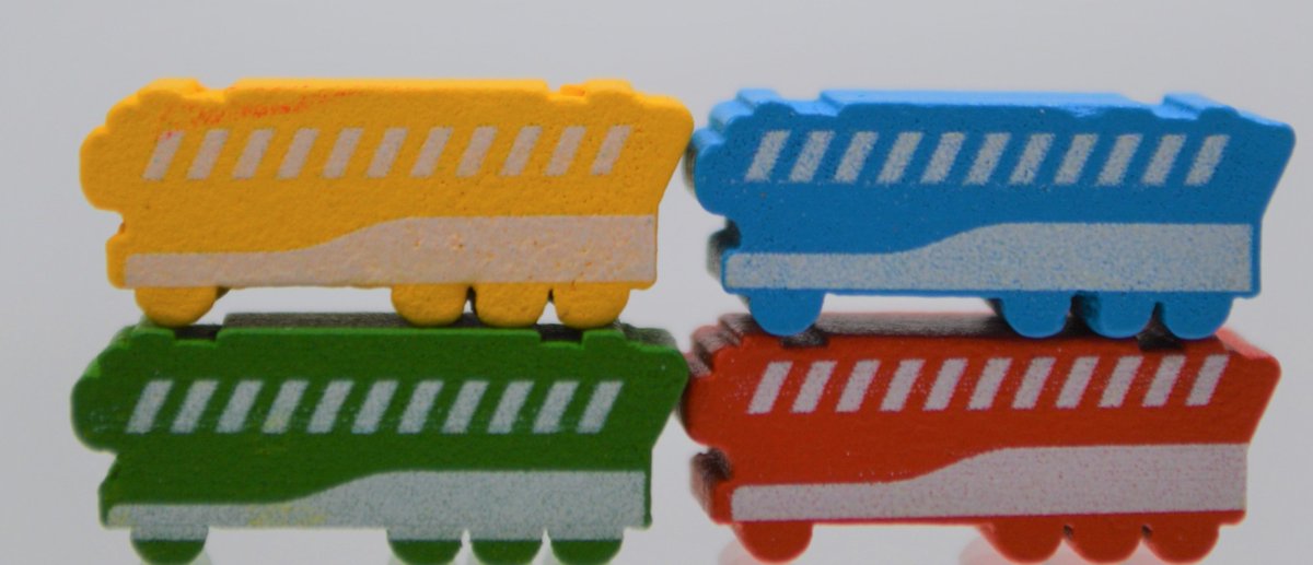 QSFGames's tweet photo. A little sneak peek of some components from our upcoming game, Freight Cars. Look at the little train meeples! ...Treeples?🤔 https://t.co/xw62C4Xeo6
