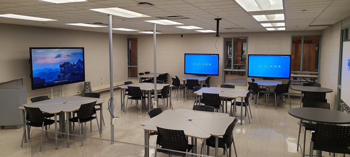 SacredHeartLLC's tweet photo. Very excited 😁 about the new interactive Smartboards and new furniture in the library @SacredHeartCHS Our tech-enabled learning lab is ready for students to connect, collaborate, create, and explore. #21Clearning https://t.co/NmGqthMbLn