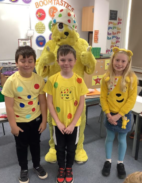 LevenSchool's tweet photo. Our children have had a great day today raising money for Children in Need. They guessed how many spots were on the cake, decorated Pudsey bandannas, bought Pudsey biscuits and even met Pudsey bear himself! #childreninneed2021 https://t.co/I0tDRyKoEz