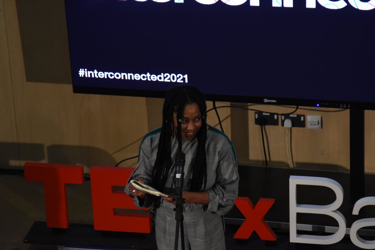 tedxbath2023's tweet photo. @Keke_Thom marking the end of a fantastic two nights with another emotive poem #TogetherWeThrive #Interconnected2021 #TEDxBath https://t.co/MJ45RRF25W