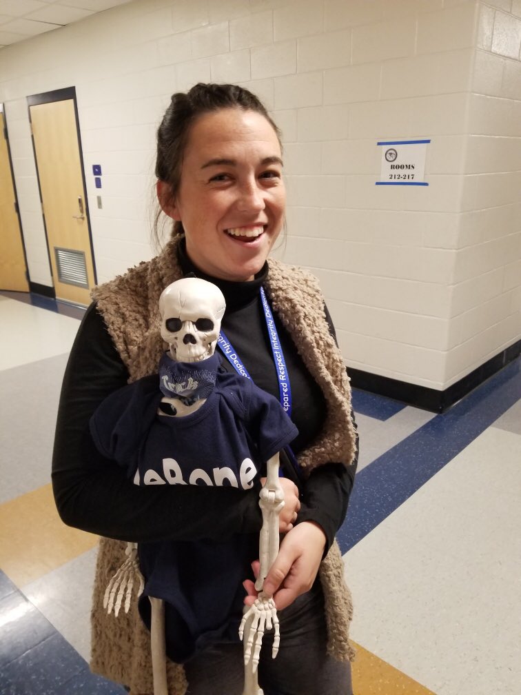 2020-2021 CEW South Rookie Teacher of the Year, Ms. Kelly Reardon (7th grade Social Studies) and LeBone working after school. 
Don’t tell him, but it looks like LeBone is missing a finger!