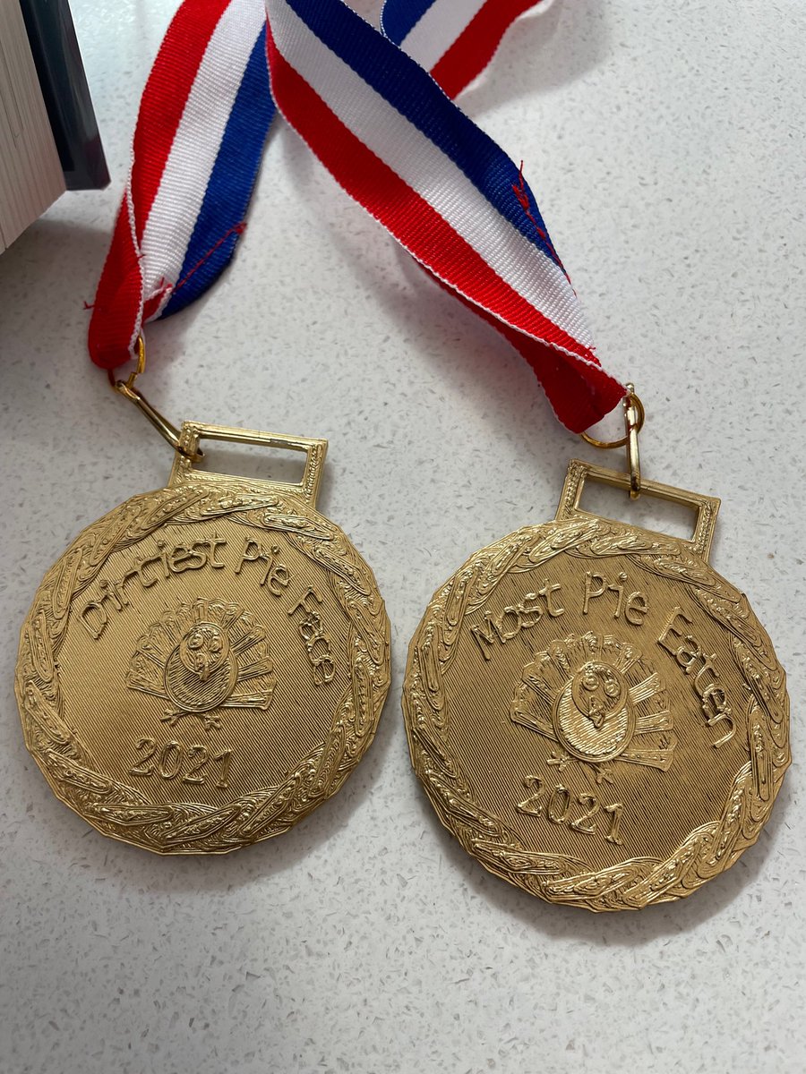 sarahsteele2006's tweet photo. RHHS got ready to head into Tgiving break with a pie eating contest! Thanks to all of our contestants for participating and @RHHSLibrary for making our awesome medals! https://t.co/00KmaJ1rNU