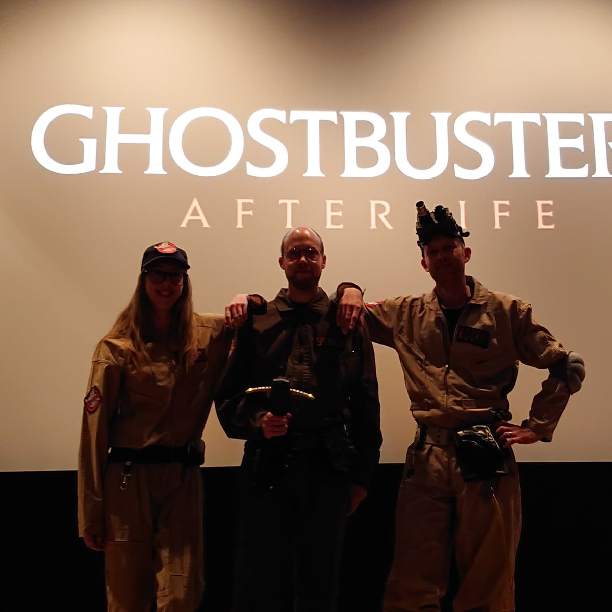 GuyfrAndromeda's tweet photo. Saw Ghostbusters: Afterlife with my siblings yesterday. I highly recommend it, it was even touching at times. Big thanks to the girl running the projector for taking these photos of us afterwards, with the movie paused at the logo. ❤️ https://t.co/ImrjTahPaI