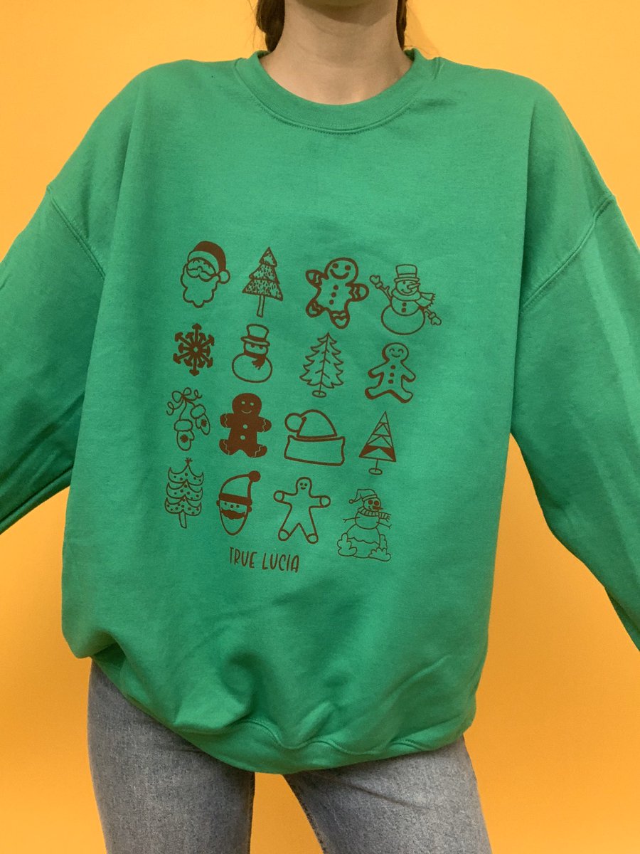 Our new Holidaze design just launched and I’m obsessed ✨ Did a similar design to our mushroom design but with all things that make us feel warm &amp; fuzzy this holiday season ✨ truelucia.com Crews are $38, Tees are $25! Ships out Monday 💕 All hand printed with love