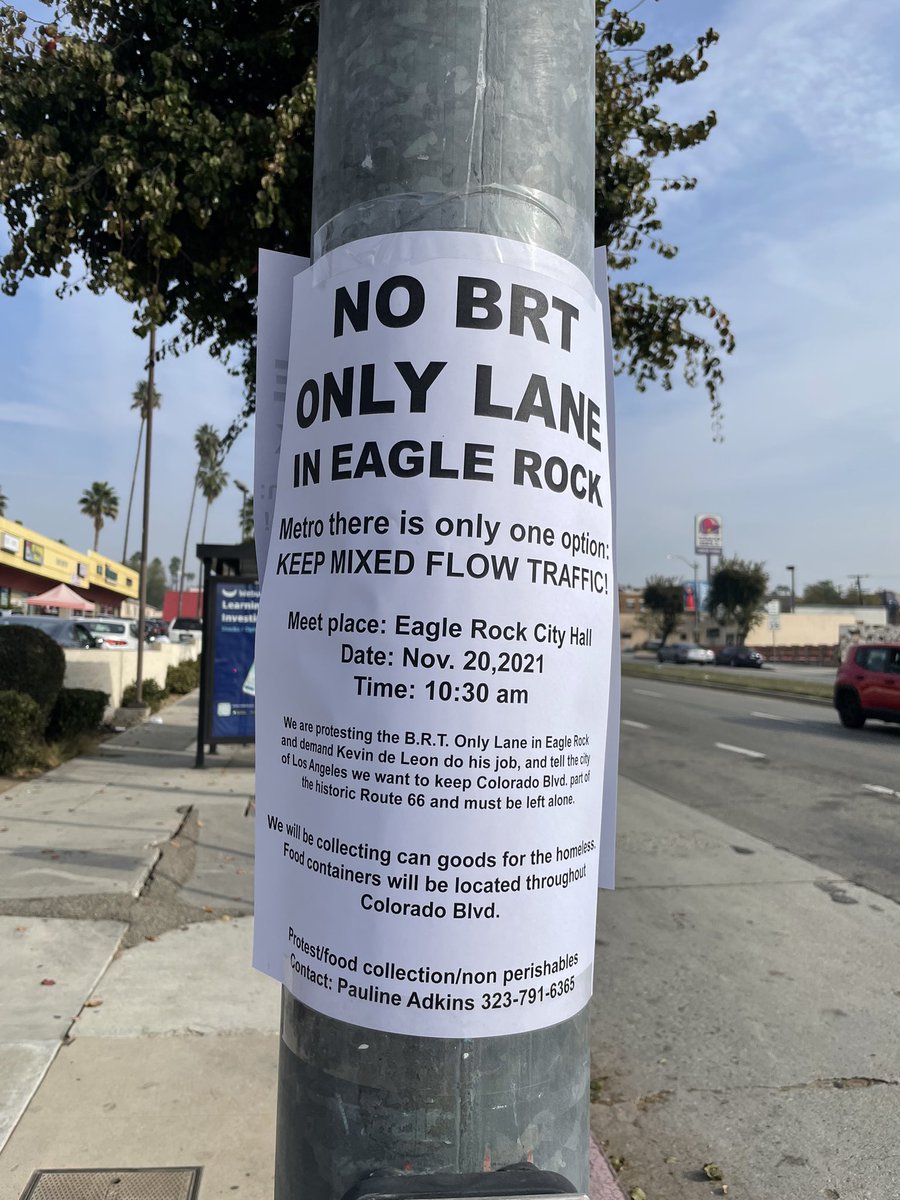 Dueling posters in Eagle Rock about the NoHo to Pasadena BRT project. Fortunately there is a good way to make decision between the two: what’s best for bus riders.